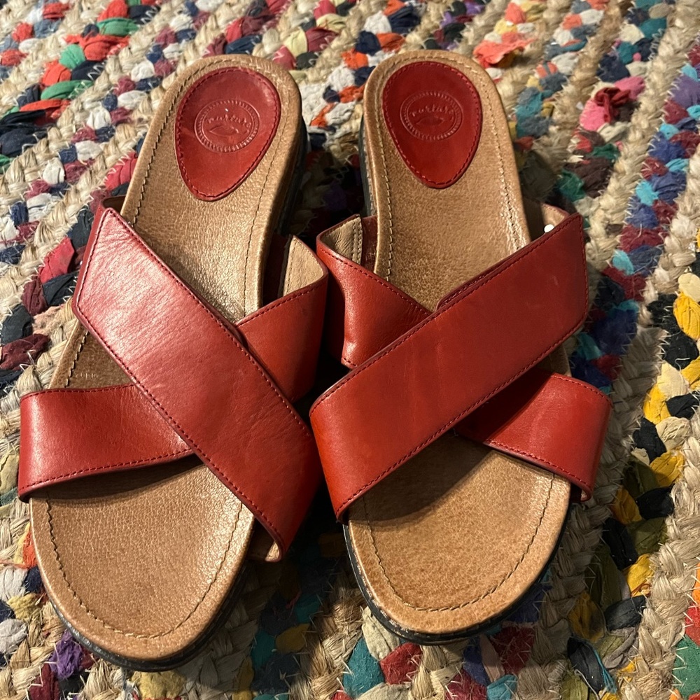 Nurture red slides.  Never worn.  Size 10.